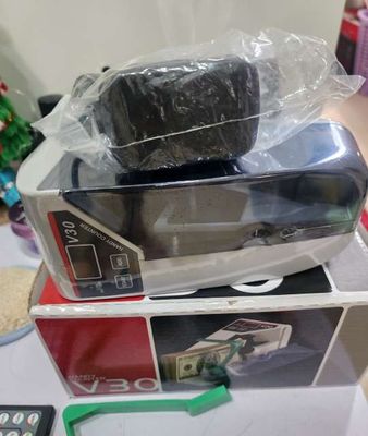 Máy đếm tiền mini xách tay. Mua bán Đồ dùng văn phòng tại Quận 3 Tp Hồ Chí Minh được đăng bởi thanh