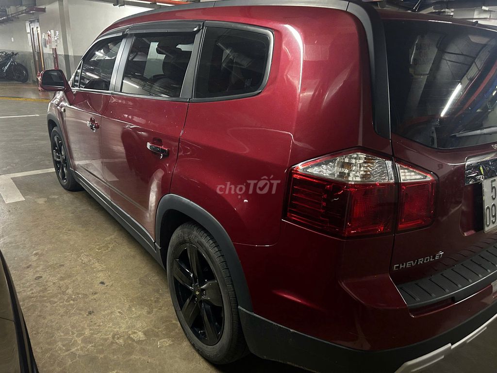 Chevrolet Orlando 2014 Đỏ 57000km. Mua bán Ô tô tại Quận 10 Tp Hồ Chí Minh được đăng bởi Từ Minh Hằng hình 3