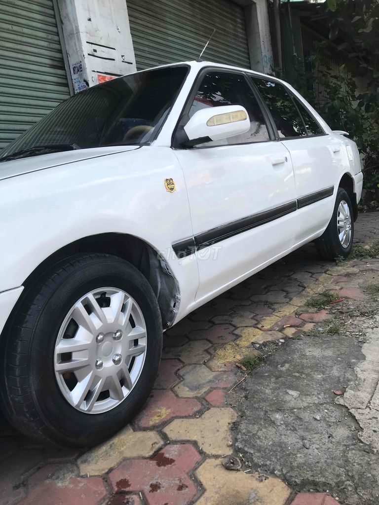 Mazda 323 1995 - 42tr. Mua bán Ô tô tại Quận 12 Tp Hồ Chí Minh được đăng bởi Nguyễn Văn Tùng hình 2