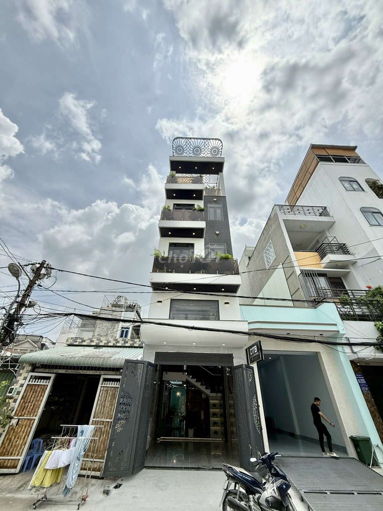Nhỉnh 8 tỷ Siêu Phẩm 4 Tầng có Thang Máy Hẻm 10m thông Trung Mỹ Tây 2A