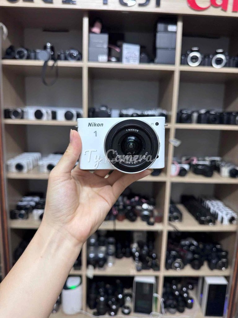 Máy ảnh Nikon J1 Trắng. Mua bán Máy ảnh, Máy quay tại Quận Liên Chiểu Đà Nẵng được đăng bởi Ty camera  Đà Nẵng hình 1
