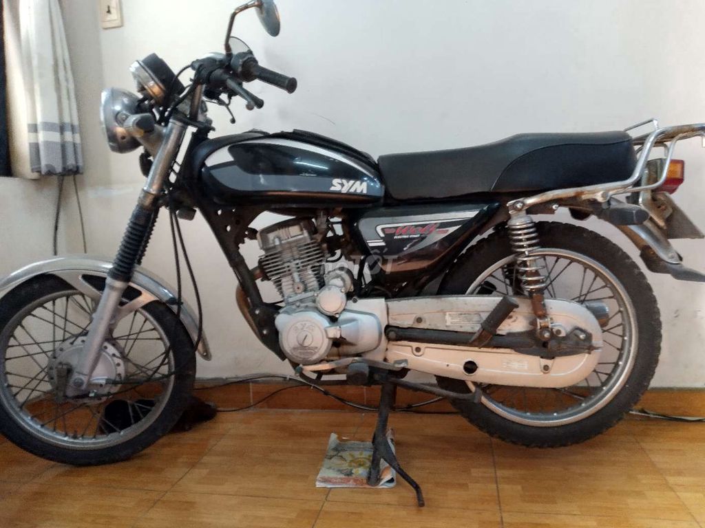 SYM Wolf Đen. Mua bán Xe máy tại Quận 7 Tp Hồ Chí Minh được đăng bởi QuangMinh hình 1