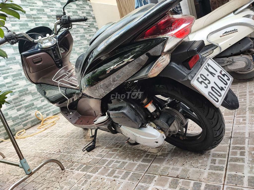 Honda PCX 2010 Đen. Mua bán Xe máy tại Quận 4 Tp Hồ Chí Minh được đăng bởi Tonydao hình 6