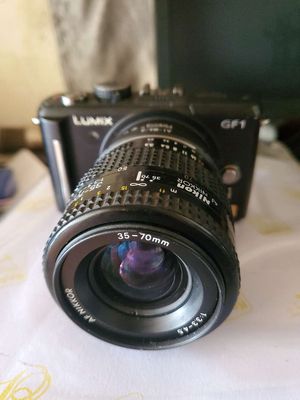 Cần bán máy lumix gf1 2 lens