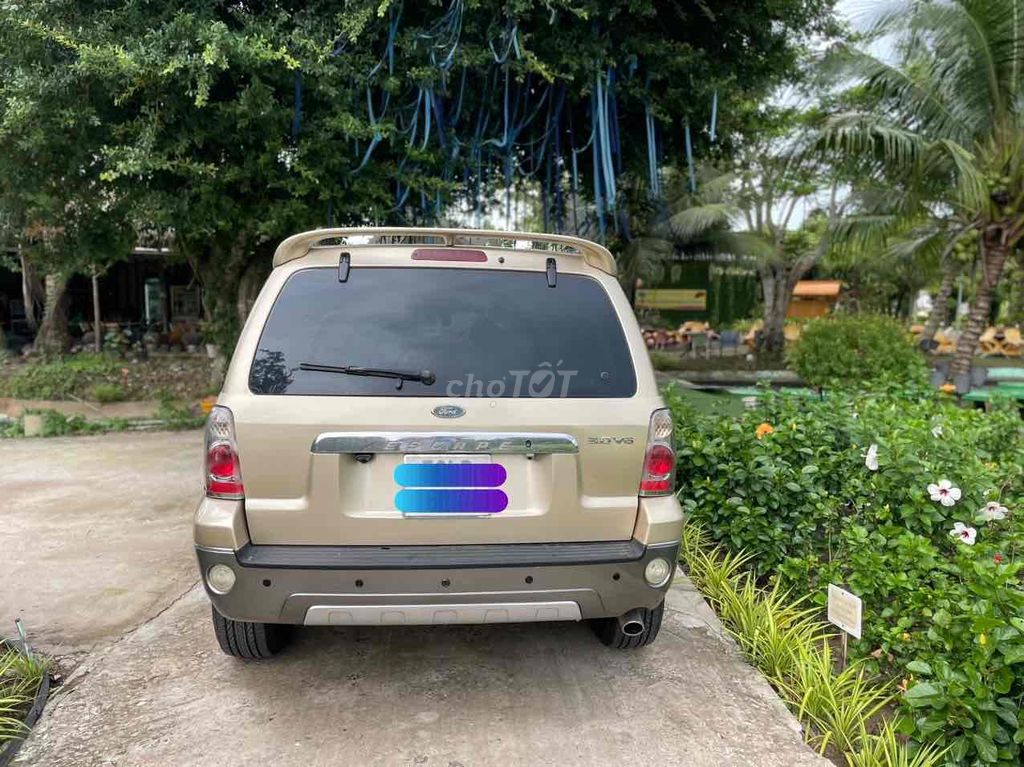 Ford Escape 2003 2.0 MT 4X2 - 2000 km. Mua bán Ô tô tại Quận 7 Tp Hồ Chí Minh được đăng bởi Lê Vy hình 9