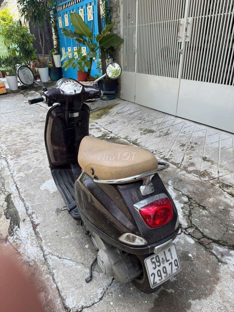 Piaggio Vespa LX бензиновый коричневый