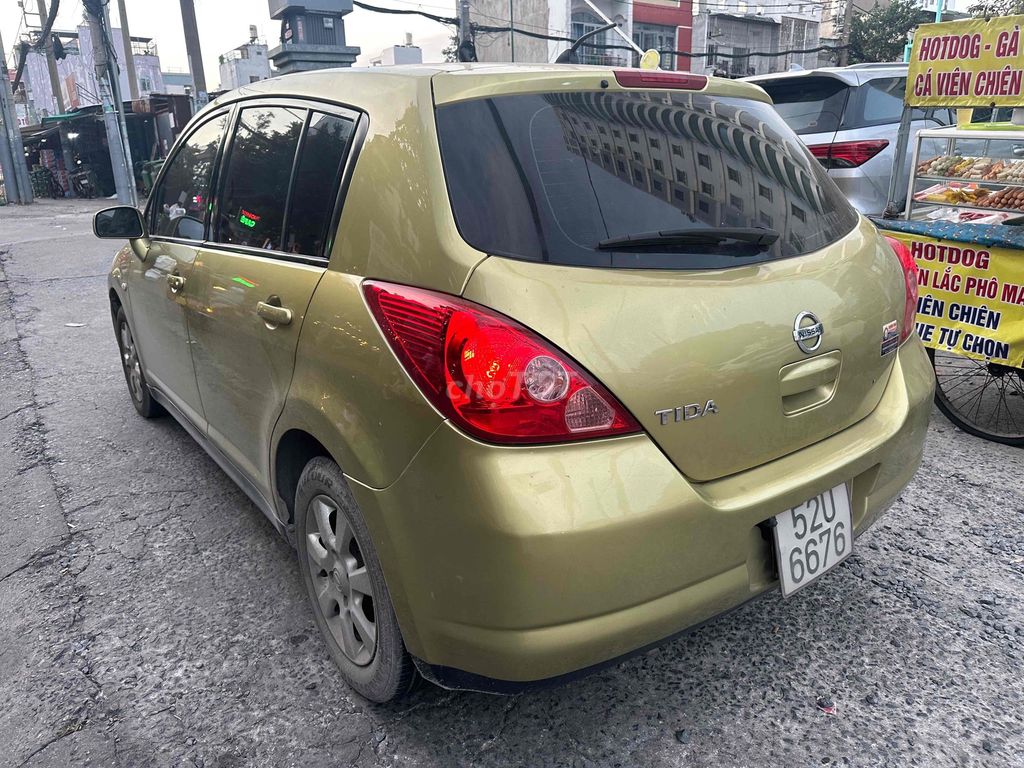 Nissan Tiida Vàng đồng 5 chỗ Số tự động. Mua bán Ô tô tại Quận Tân Phú Tp Hồ Chí Minh được đăng bởi Bảo Lam hình 3