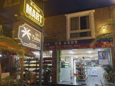 SIÊU THỊ K-MEGA logo