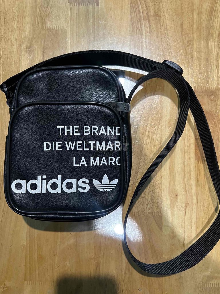 Túi đeo chéo Adidas da Đen chính hãng 100%. Mua bán Túi xách tại Huyện Trảng Bom Đồng Nai được đăng bởi Sáng hình 1