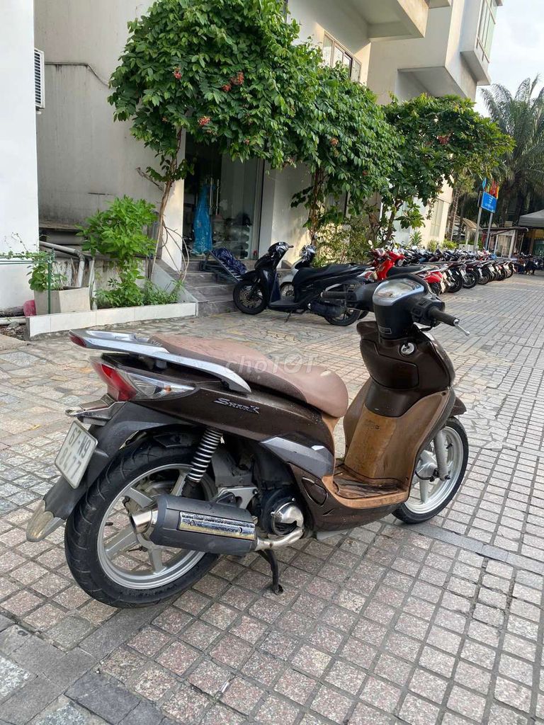 SYM Shark màu Nâu. Mua bán Xe máy tại Quận 7 Tp Hồ Chí Minh được đăng bởi trình minh sơn hình 4