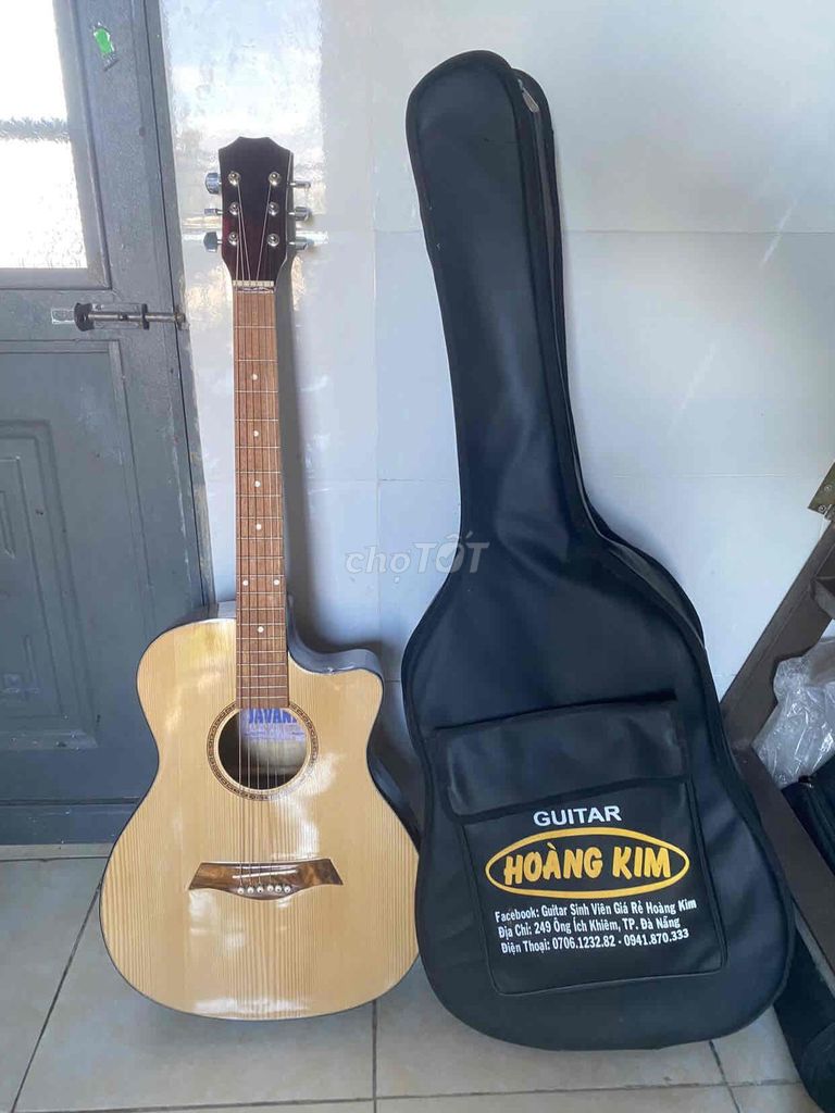 Đàn guitar Hoàng Kim Màu gỗ Mới. Mua bán Nhạc cụ tại Quận Liên Chiểu Đà Nẵng được đăng bởi Thuỳ Trâm hình 1