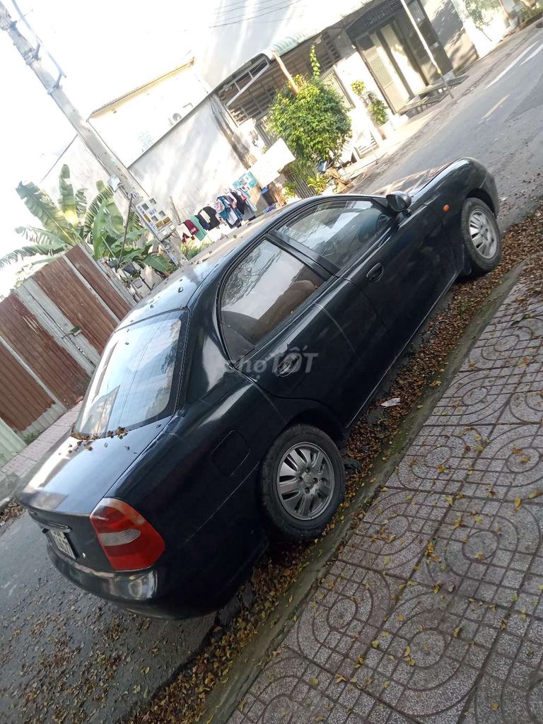 Daewoo Nubira Đen Số sàn. Mua bán Ô tô tại Thành phố Dĩ An Bình Dương được đăng bởi Minh hình 11