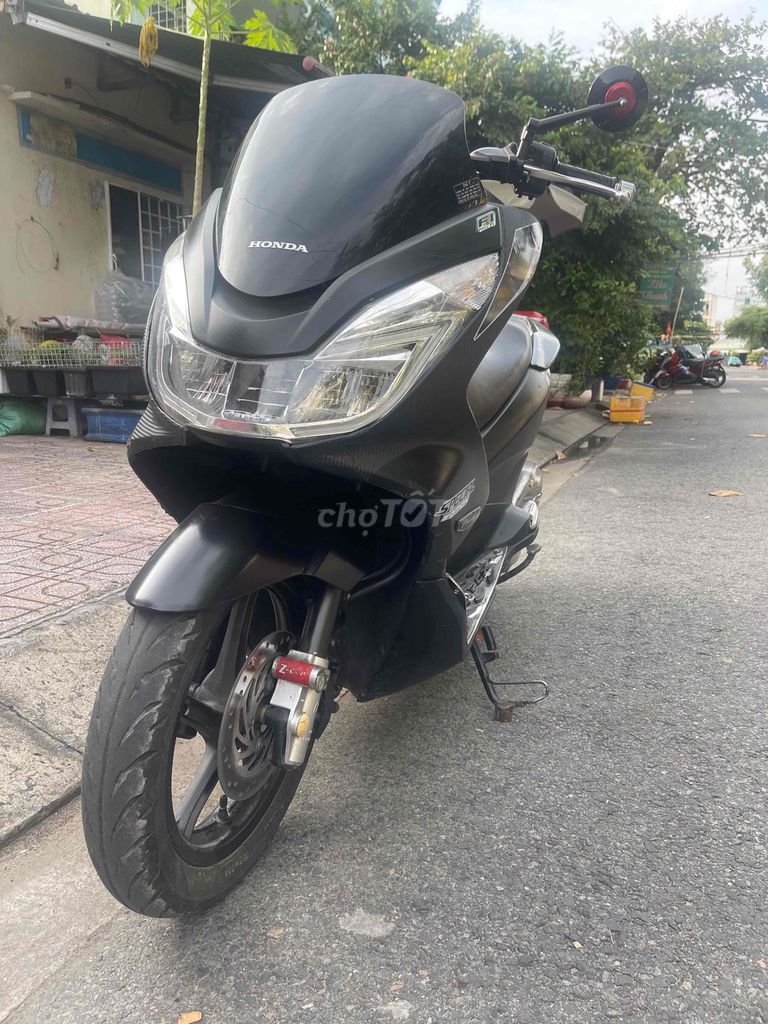 Honda PCX 2014 Đen 70000 km. Mua bán Xe máy tại Quận 8 Tp Hồ Chí Minh được đăng bởi hoành tử ếch hình 3