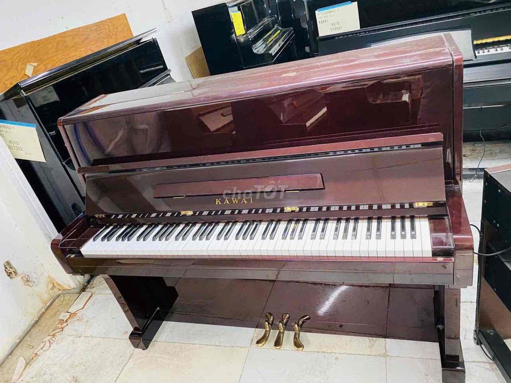 piano cơ kawai kts55