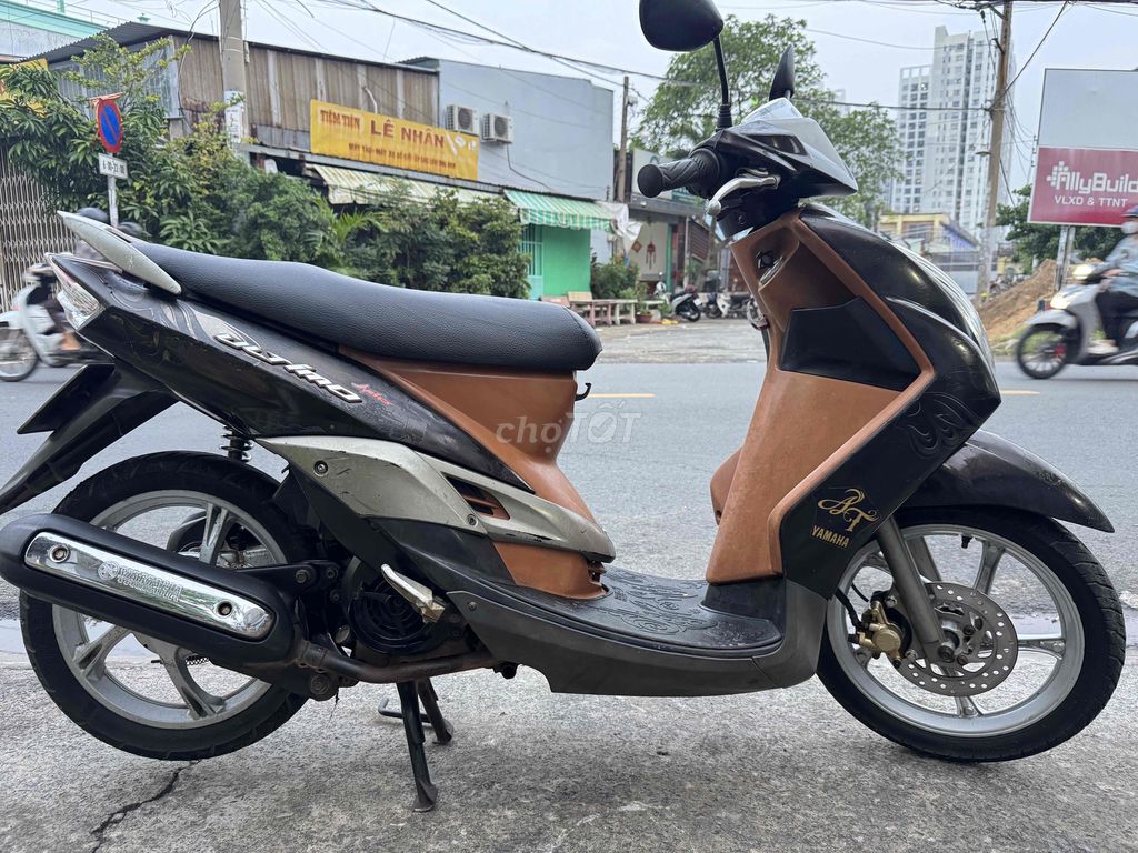 Скутер Yamaha Mio коричневый