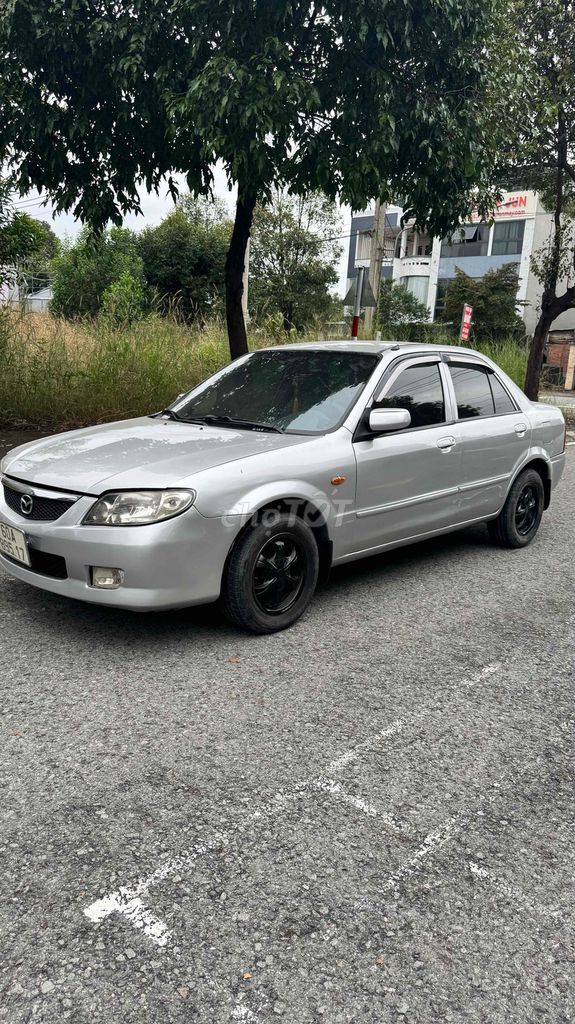 Mazda 323 2003 Bạc. Mua bán Ô tô tại Thị xã Bến Cát Bình Dương được đăng bởi Nguyên xe rẻ hình 3