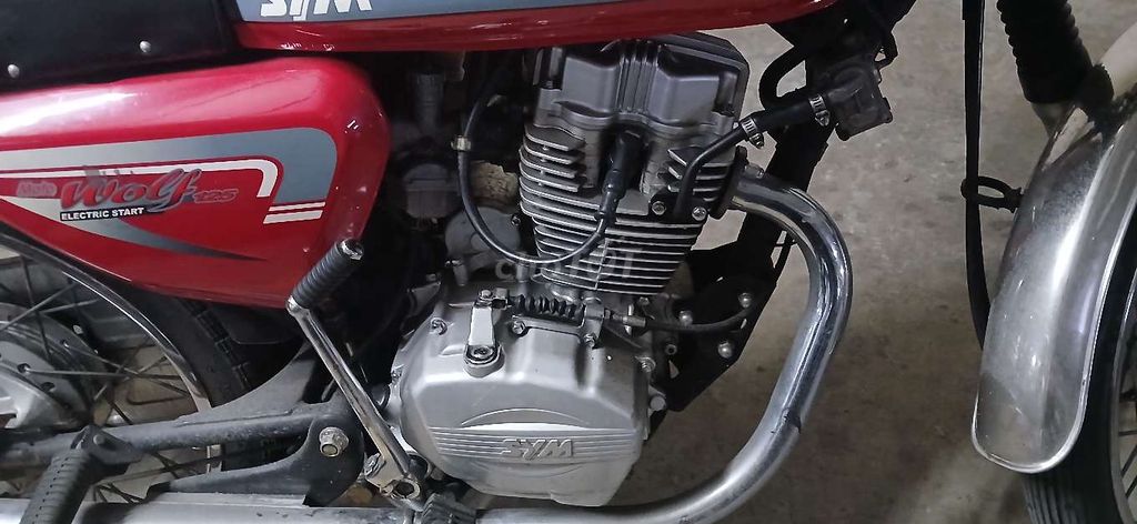 Xe mô tô SYM Wolf 125 năm 2010 màu đỏ rin 90%. Mua bán Xe máy tại Quận 5 Tp Hồ Chí Minh được đăng bởi Nguyễn Văn Bé hình 1