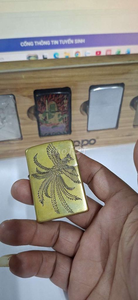 Bật lửa Zippo Đồng Vàng Phượng hoàng. Mua bán Đồ sưu tầm, đồ cổ tại Huyện Hóc Môn Tp Hồ Chí Minh được đăng bởi Trần Thành hình 1