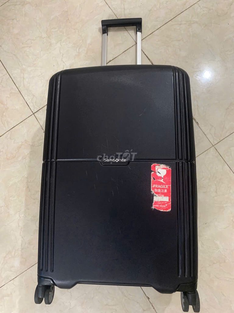 Vali Samsonite nhựa đen 24 inch đã sử dụng. Mua bán Túi xách tại Quận Ngũ Hành Sơn Đà Nẵng được đăng bởi Minh Quang hình 1