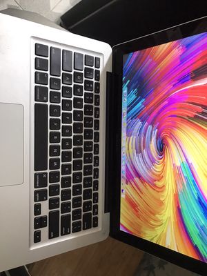 Laptop MacBook Pro i5 8G SSD256G zin pin tốt mượt