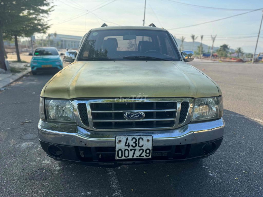 Форд Рейнджер XLT 2,5 л 4x4 MT 2004 Черное золото