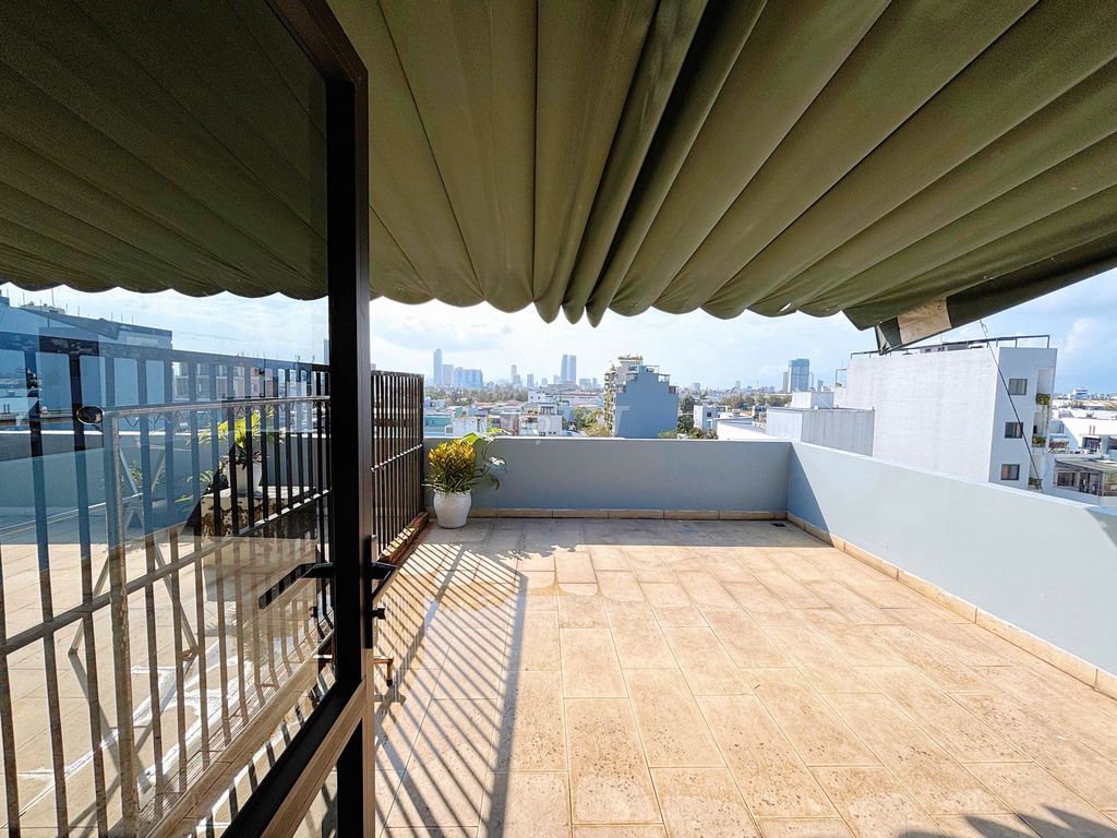 Bright 1-bedroom with a rooftop terrace on An Cư 7 — photo 12
