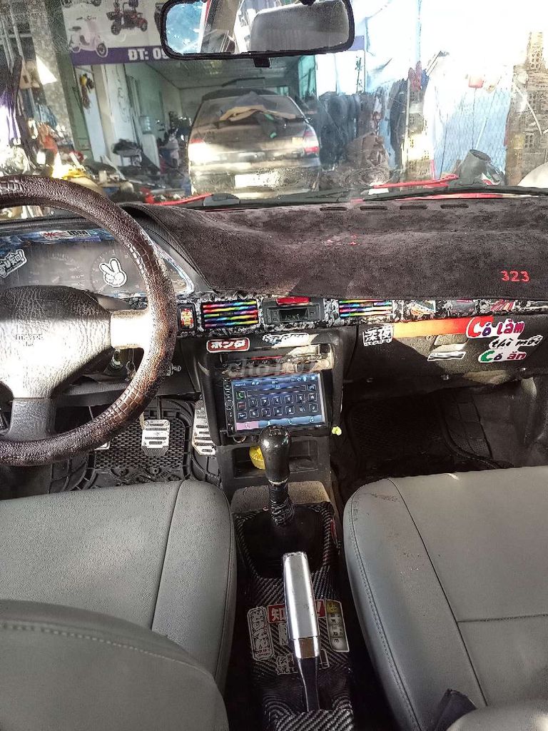 Mazda 323 Trắng 2000km. Mua bán Ô tô tại Huyện Krông Pắc Đắk Lắk được đăng bởi hau  hình 12