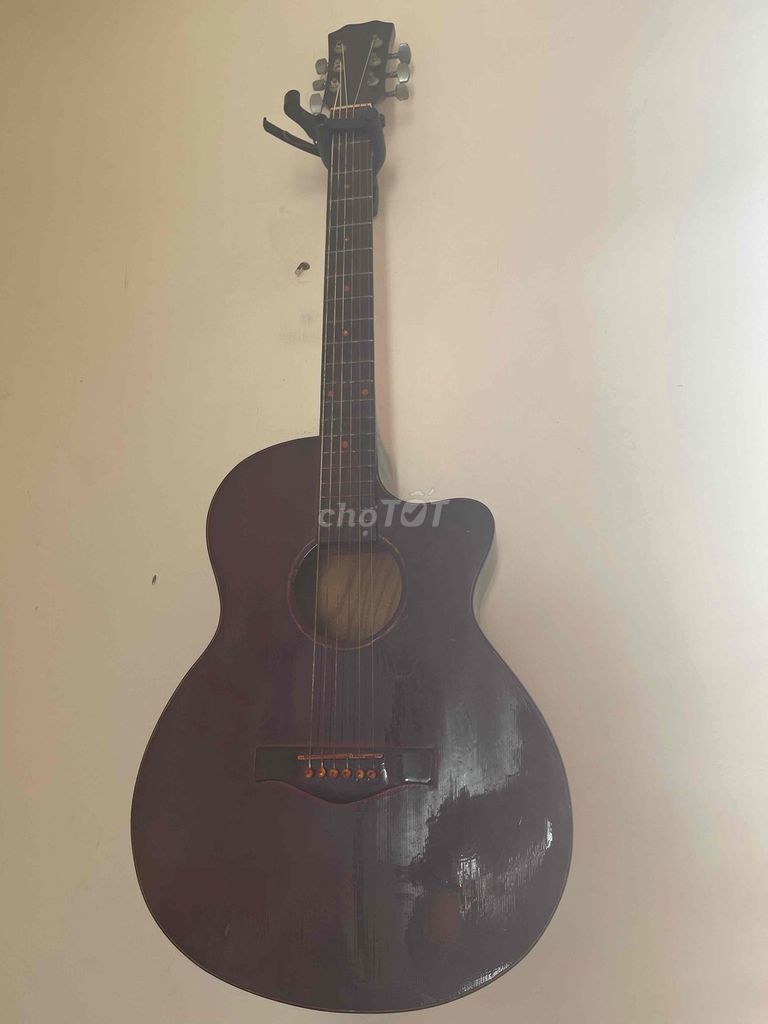 Đàn guitar gỗ màu Nâu. Mua bán Nhạc cụ tại Thành phố Biên Hòa Đồng Nai được đăng bởi Nguyễn Văn Thắng hình 1