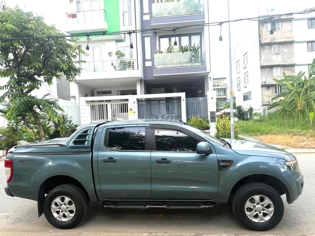 Ford Ranger 2014 XLS 2.2 4x2 AT - 133000 km. Mua bán Ô tô tại Quận 5 Tp Hồ Chí Minh được đăng bởi Blue Tyres hình 2