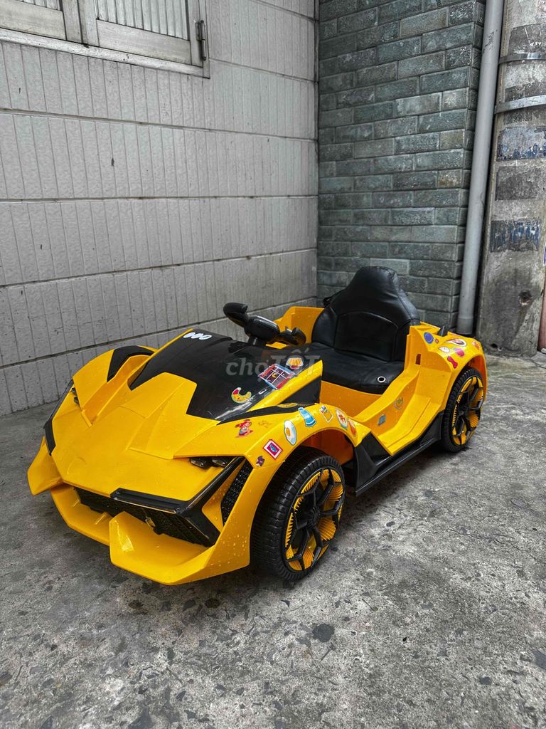 Xe ô tô điện trẻ em Lamborghini Vàng 2-6 tuổi cũ. Mua bán Mẹ và bé tại Quận 1 Tp Hồ Chí Minh được đăng bởi Kiến Văn hình 1