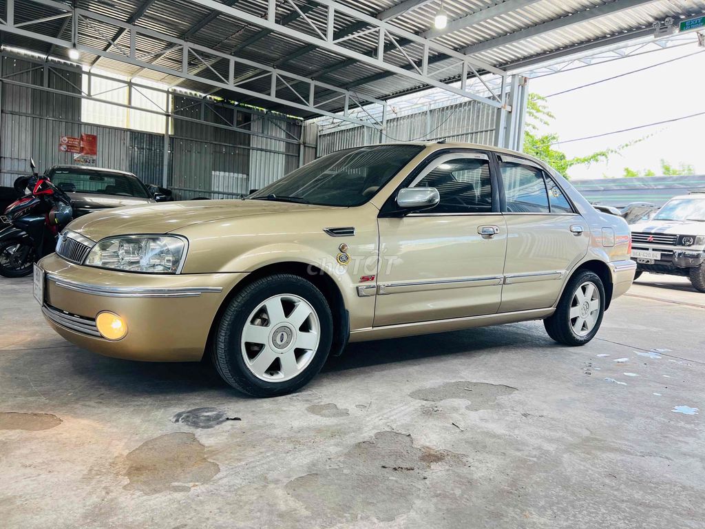 Ford Laser 2002 GHIA 1.8 MT - 76000 km.Siêu Cọp. Mua bán Ô tô tại Thành phố Phan Thiết Bình Thuận được đăng bởi Tuấn Ôtô Bình Thuận hình 4