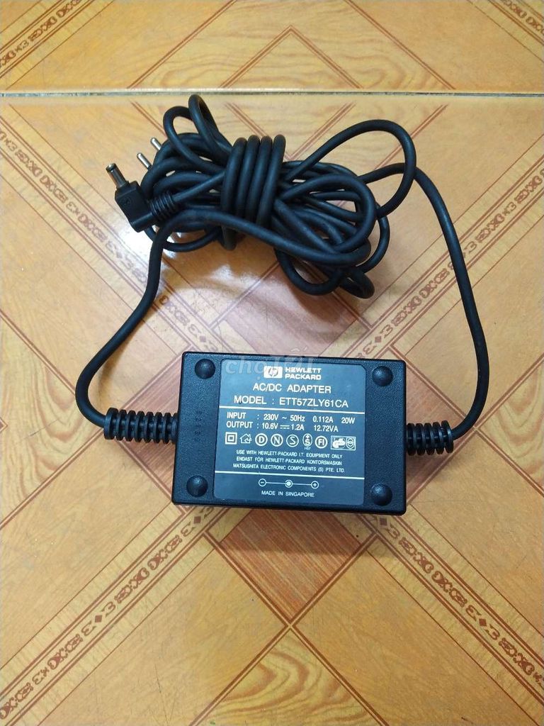 Adapter zin USA HP 10.6v 1.2A nặng tay hon 1kg