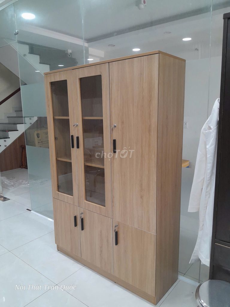 Tủ hồ sơ Trần Quốc Ván MDF Kính Vàng Gỗ. Mua bán Đồ dùng văn phòng tại Quận 6 Tp Hồ Chí Minh được đăng bởi đỗ thị kim trâm  hình 1