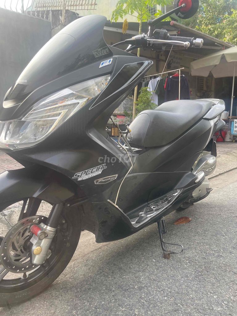 Honda PCX 2014 Đen 70000 km. Mua bán Xe máy tại Quận 8 Tp Hồ Chí Minh được đăng bởi hoành tử ếch hình 4