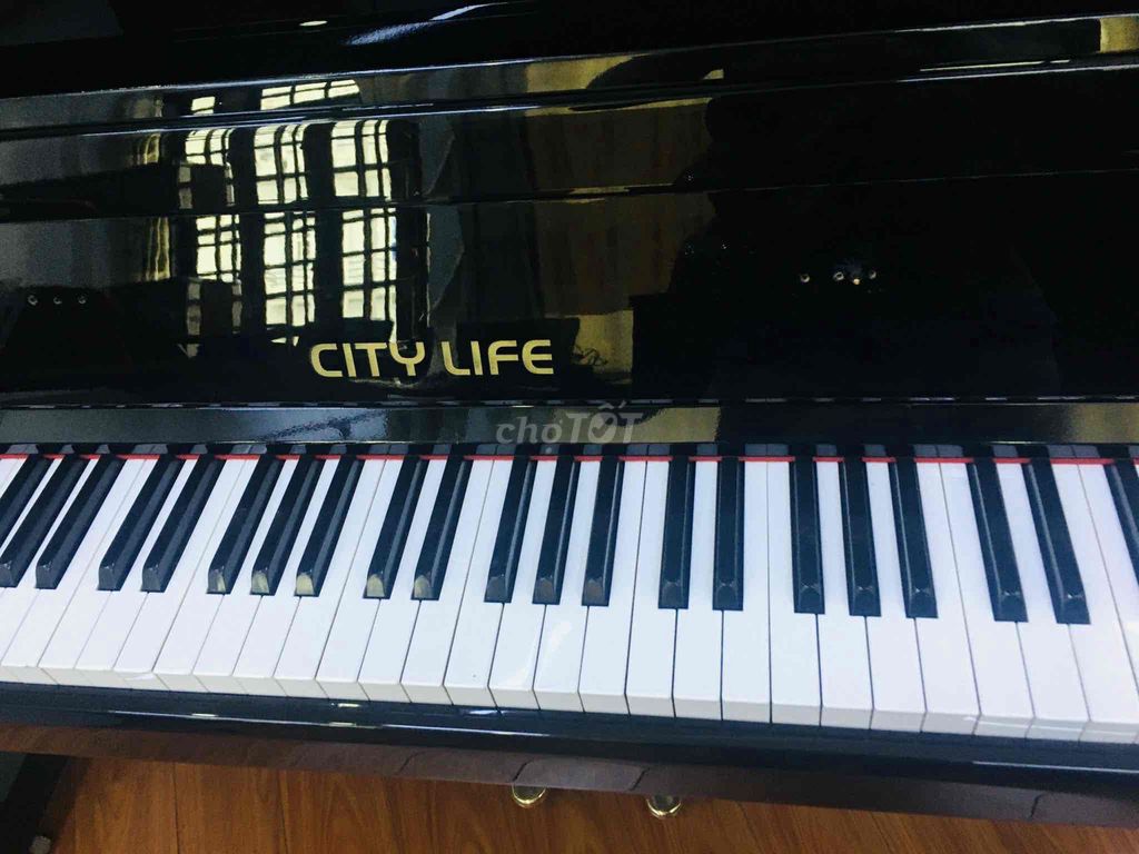 piano cơ kawai cl2