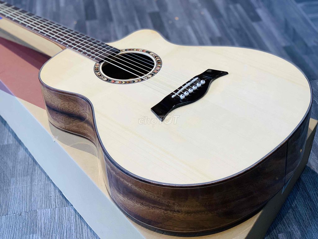 Guitar Acoustic gỗ điệp kĩ cao cấp giá tốt .