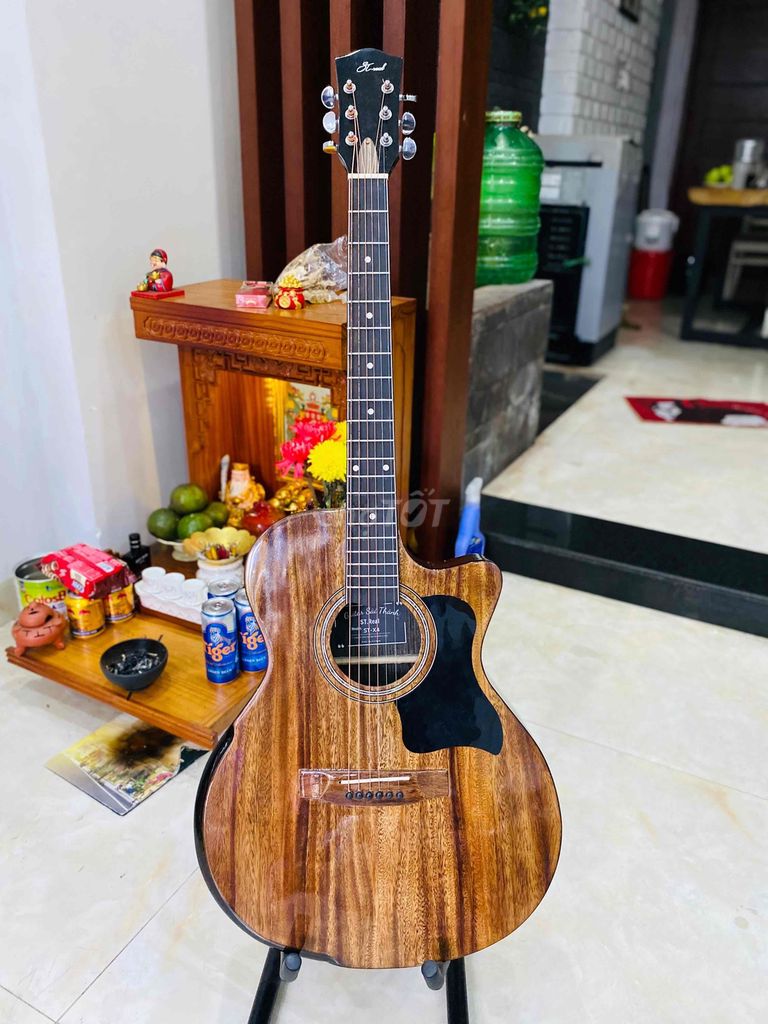 Thanh lý guitar gỗ điệp có vát bavel