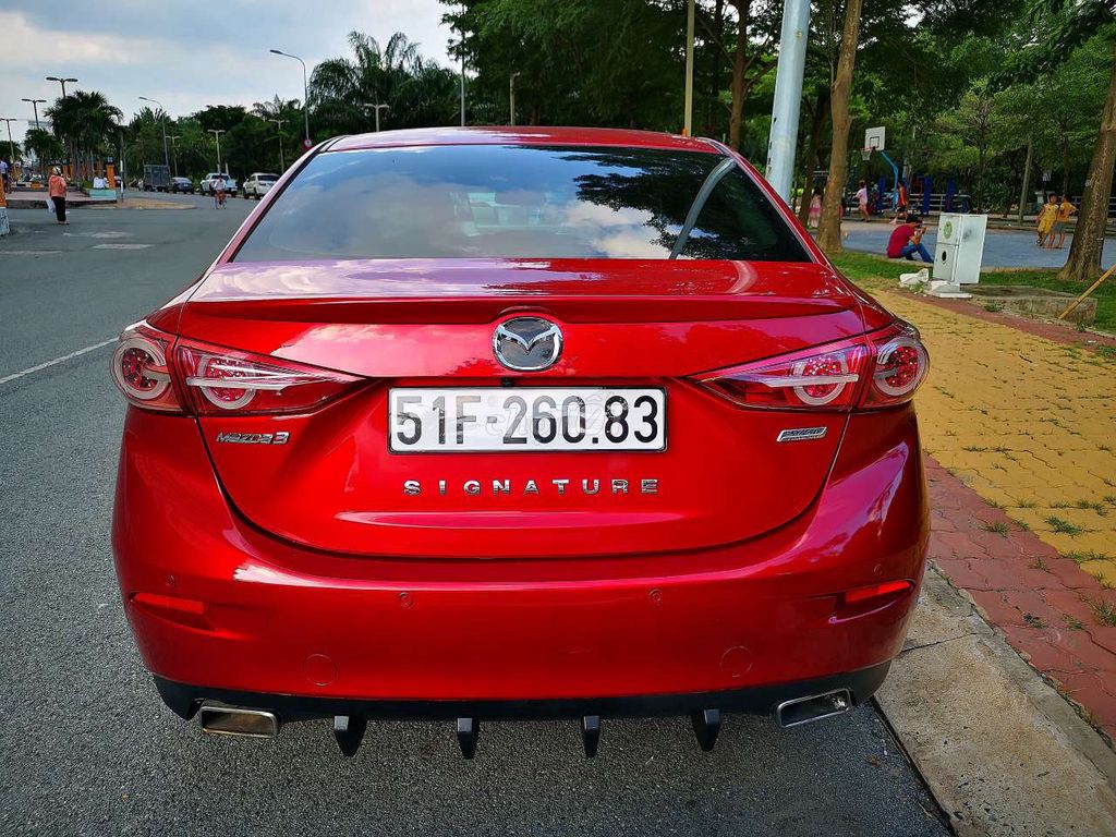 Mazda 3 đỏ pha lê 1.5 AT Sedan - 90000 km