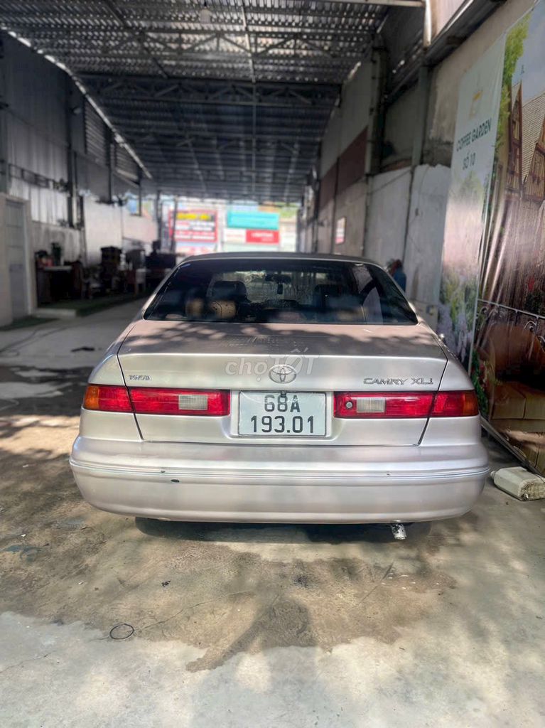 Toyota Camry 1999 - 99999 km. Mua bán Ô tô tại Huyện Vũng Liêm Vĩnh Long được đăng bởi QUOC HUYNH hình 3