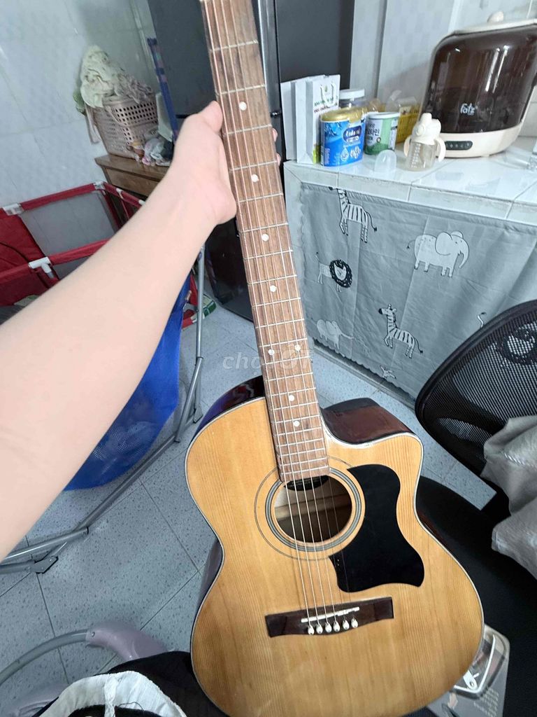 Đàn guitar acoustic gỗ nâu. Mua bán Nhạc cụ tại Thành phố Thuận An Bình Dương được đăng bởi lyly hình 1