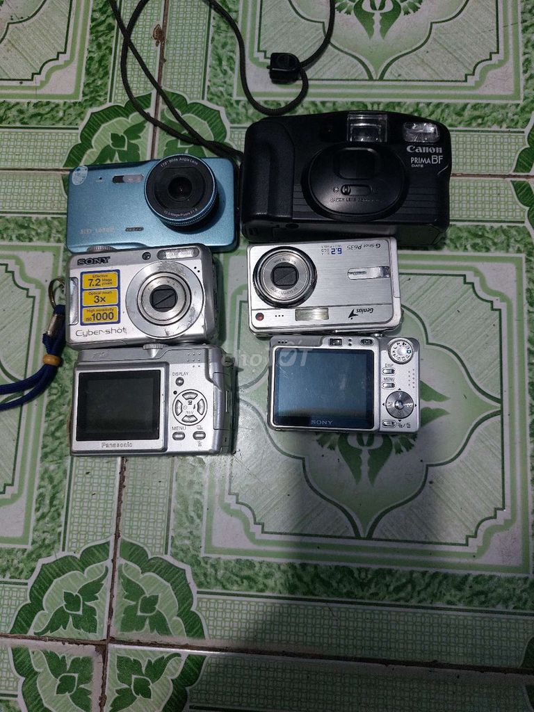 Máy ảnh Canon Đen Đã qua sử dụng. Mua bán Máy ảnh, Máy quay tại Huyện Bình Chánh Tp Hồ Chí Minh được đăng bởi tuyết  hình 1