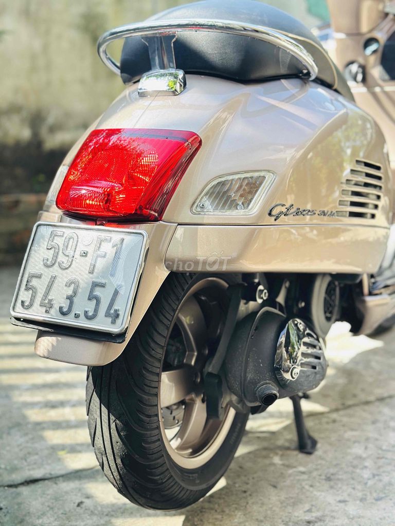 Piaggio Vespa GTS 125 2015 3VAL IE Vàng đồng. Mua bán Xe máy tại Quận 12 Tp Hồ Chí Minh được đăng bởi Ta Thanh Thai hình 8