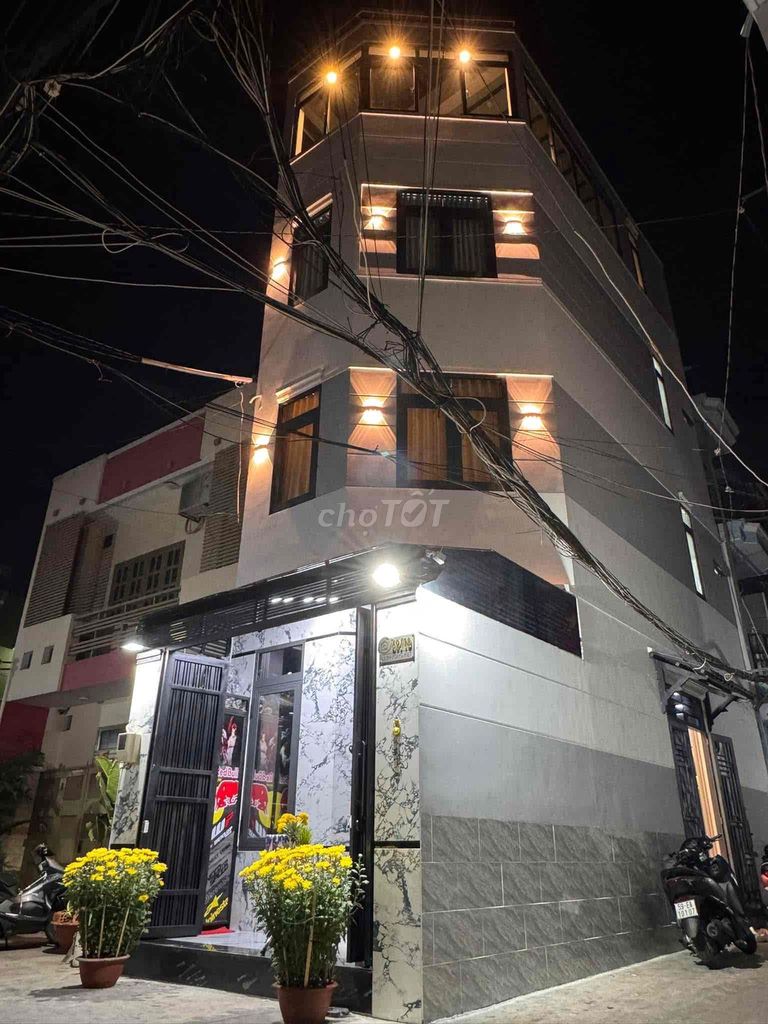 nhà góc 2 mặt tiền hẻm xe hơi đậu trước cửa , ngay chợ gò Vấp