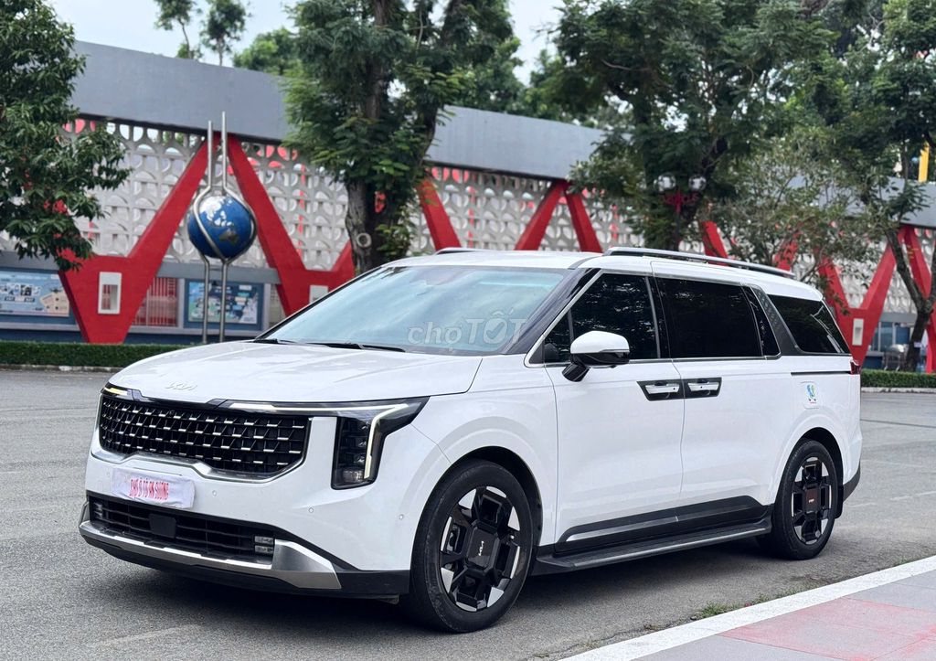 Kia Карнавал Премиум 2024 белый