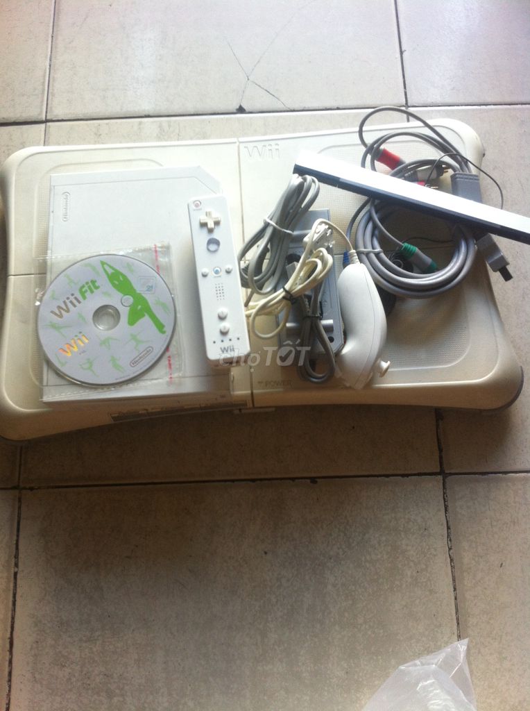 - Nintendo Wii + Wii FIT