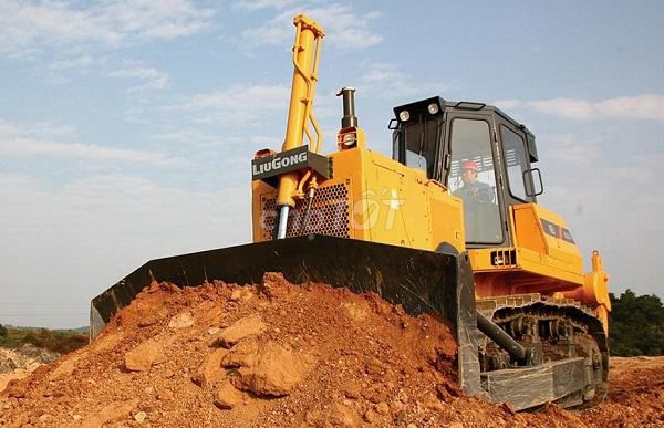 Tài Xế Lái Máy Ủi