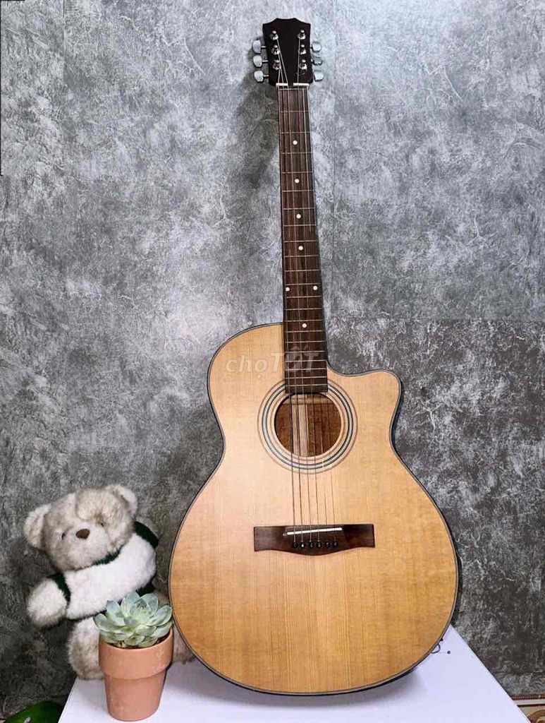 Đàn guitar gỗ màu nâu nhạt. Mua bán Nhạc cụ tại Quận Bình Tân Tp Hồ Chí Minh được đăng bởi Việt Hưng hình 1