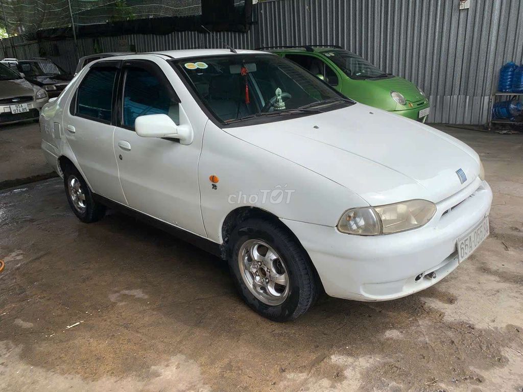 Fiat 2000 Số sàn 1.3L Trắng. Mua bán Ô tô tại Huyện Chợ Gạo Tiền Giang được đăng bởi Trần Huỳnh ÔtÔ cũ Tiền Giang hình 4