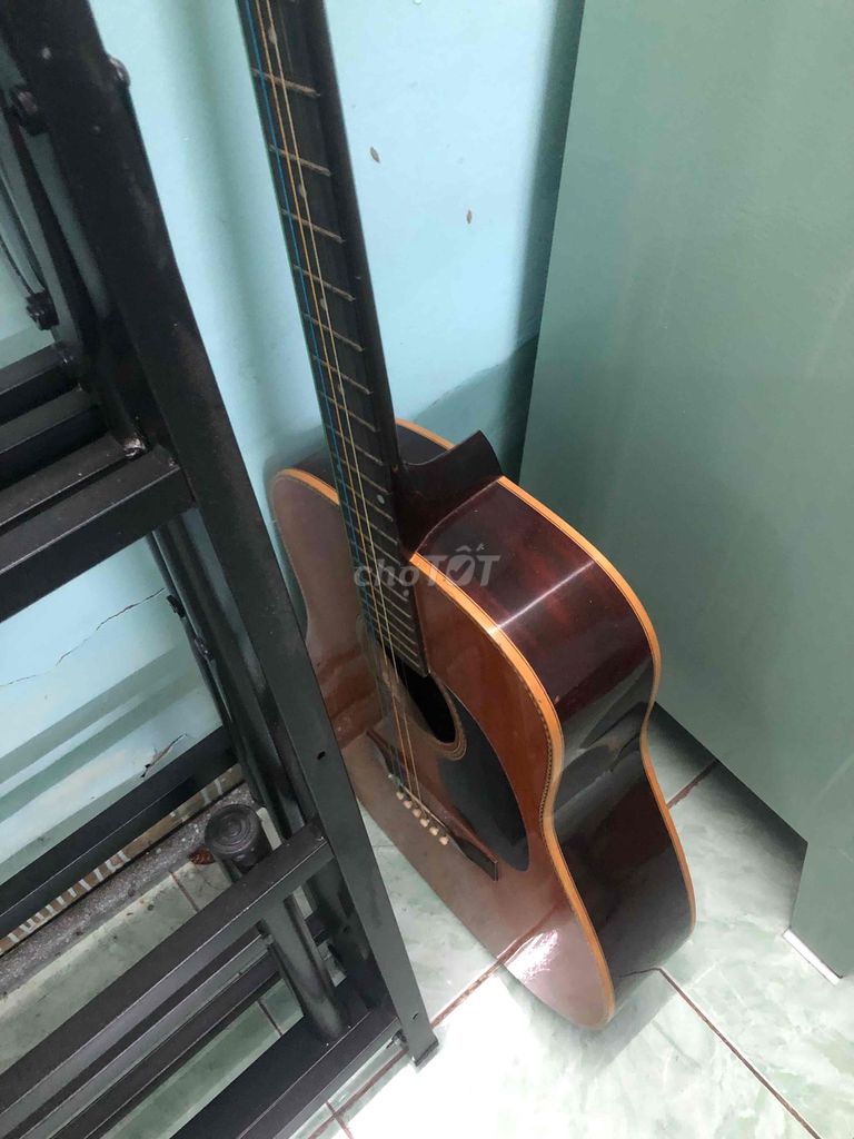 Đàn guitar gỗ màu nâu đã qua sử dụng. Mua bán Nhạc cụ tại Quận Gò Vấp Tp Hồ Chí Minh được đăng bởi Lịch bloc Tân Sửu 2021 hình 1