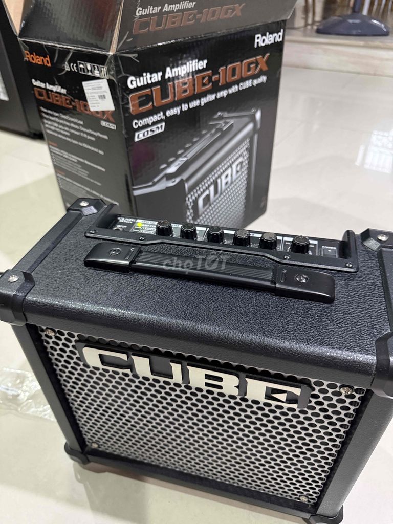 amplifier roland cube 10gx ,đàn guitar điện legend